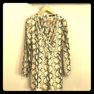 Sexy peek-a-boo back romper.